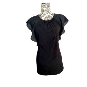 Black shirt with flared sleeves